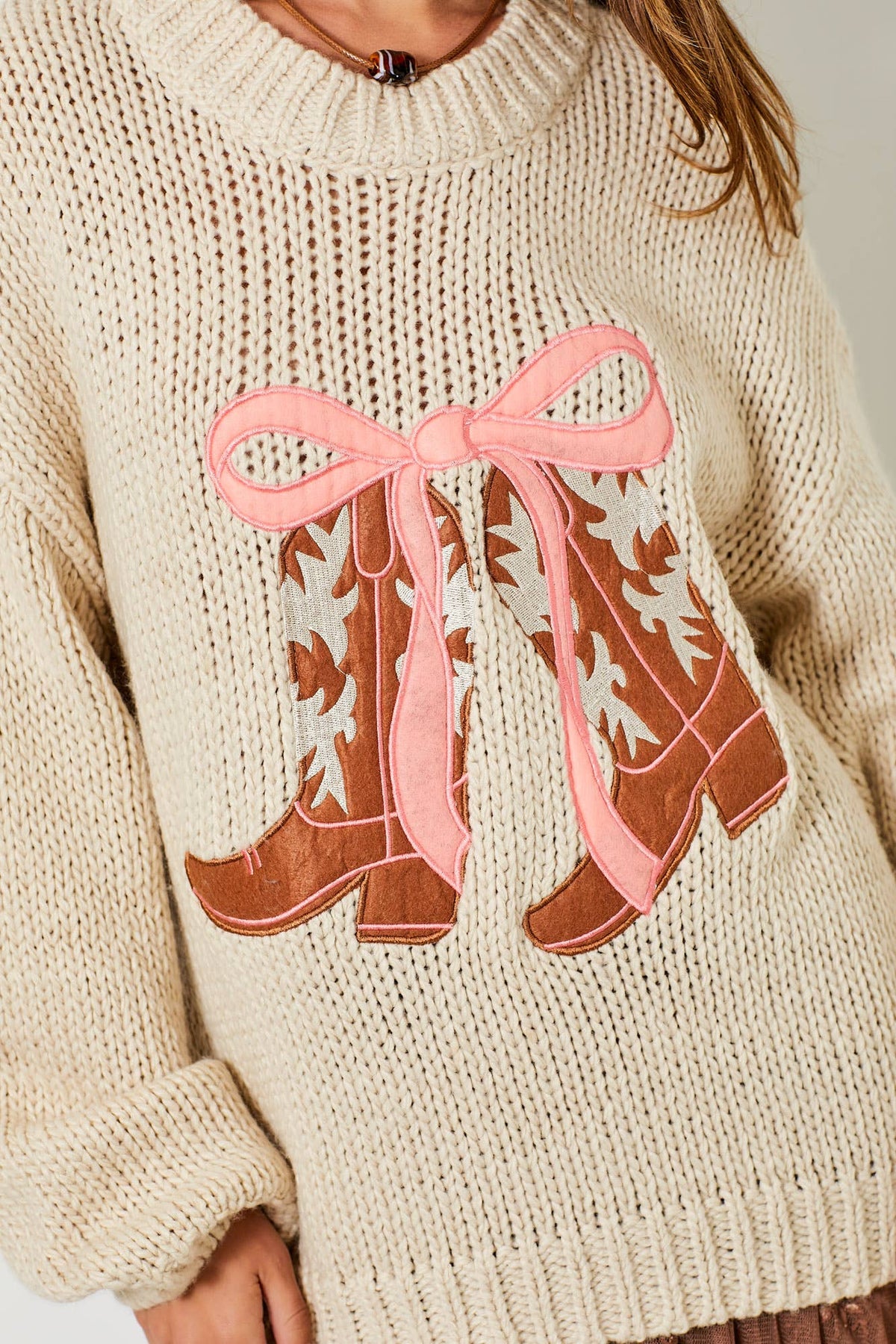 COWBOY BOOTS WITH RIBBON KNIT SWEATER